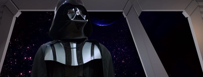 Lord Vader looking up in an Imperial room